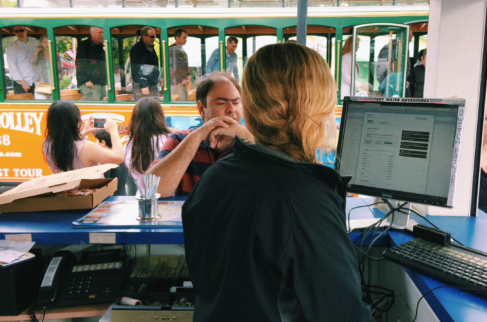 A reservationist talking to a customer