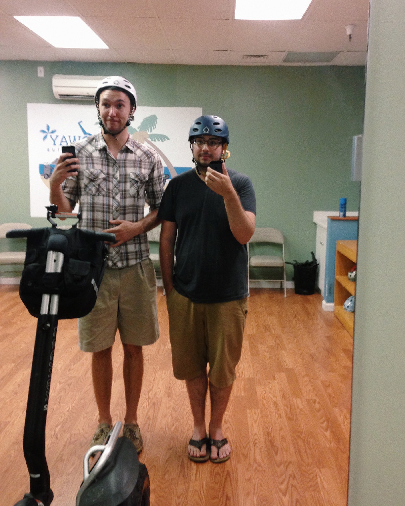A selfie of me wearing a helmet getting ready to ride a Segway